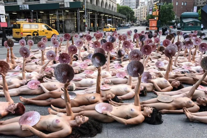 photographer spencer tunick stages one of his large scale group nude shoots in new york city