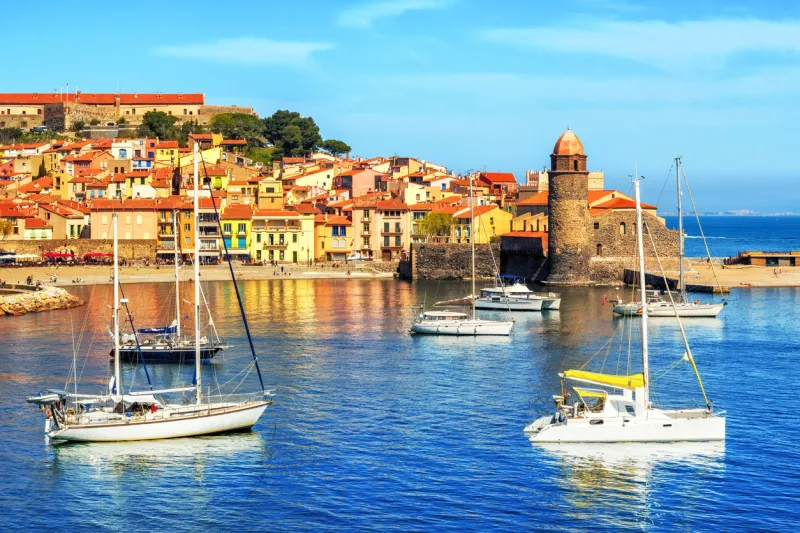 collioure, france, a popular resort town on mediterranean sea, view of the old town with notre-dame des anges church and the harbor