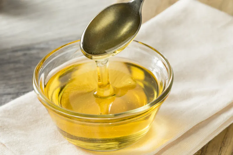 raw organic sweet light agave syrup in a bowl