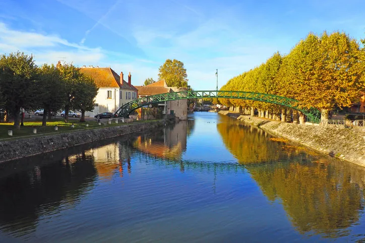 metal footbridge, built according to the gustave eiffel process, above the briare canal, in montargis, in the center-val-de-loire region in the heart of france