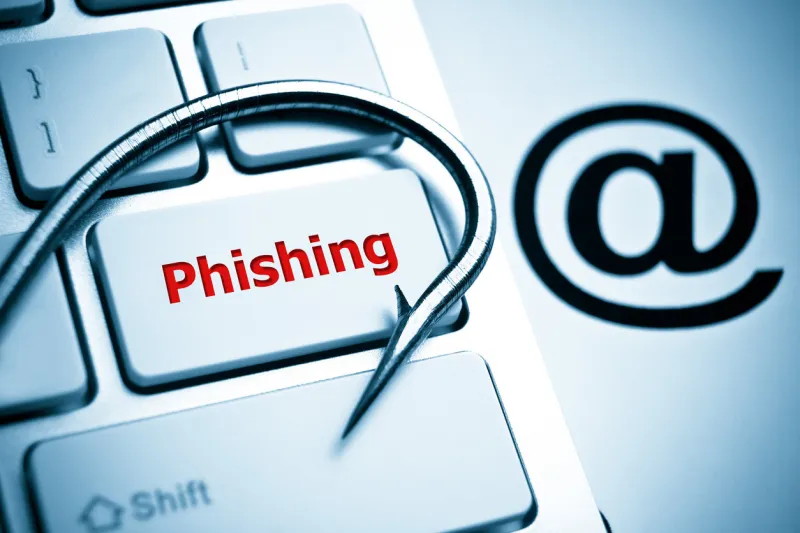 phishing   a fish hook on computer keyboard with email sign   computer crime   data theft   cyber crime