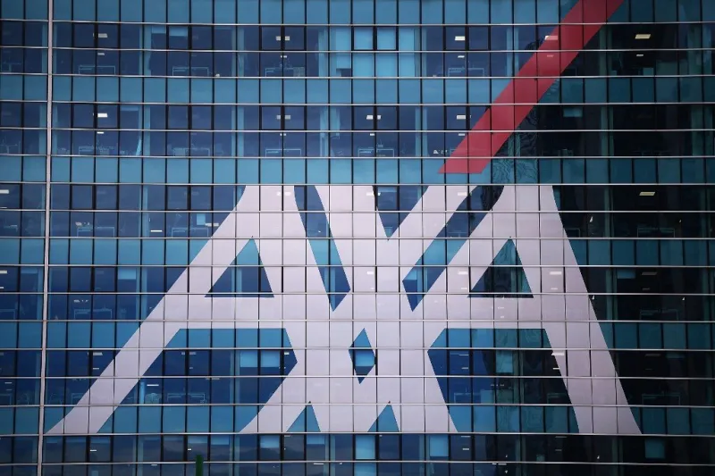 the axa logo is displayed on the facade of the axa headquarters in milan on november 7, 2017 (photo by marco bertorello   afp)