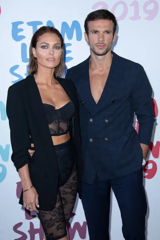 caroline receveur et hugo philip assistent au défilé etam hiver 2019 été 2020 dans le cadre de la fashion week de paris, à paris, en france, le 24 septembre 2019 photo par aurore marechal abacapresscom
