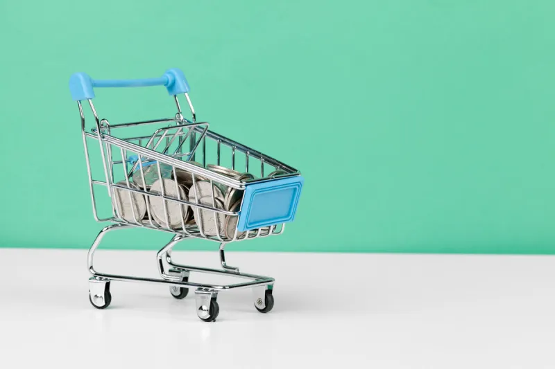 shopping cart full of coin
