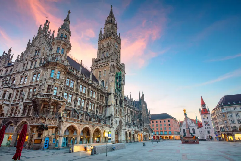 cityscape image of marien square in munich, germany during twilight blue hour