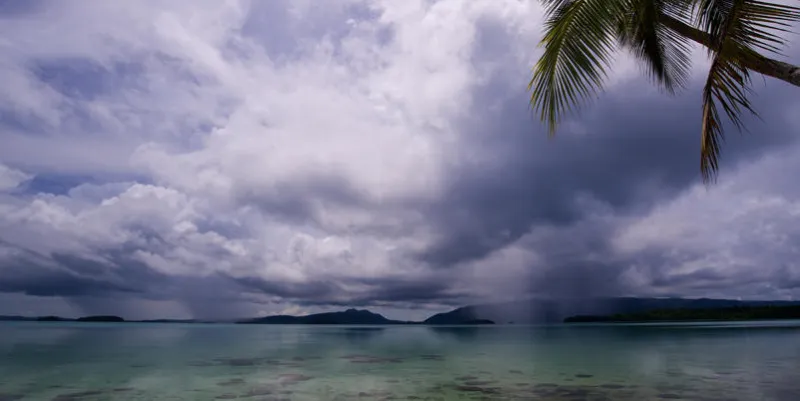rain over salt water lagoon, solomon islands