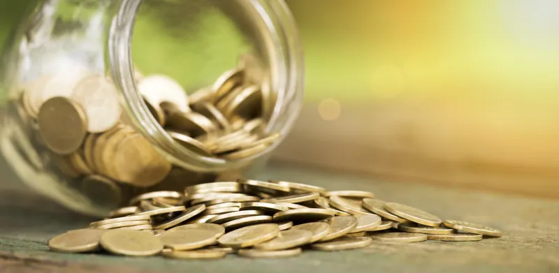 financial freedom concept, web banner of gold money coins and jar, with blank, copy space