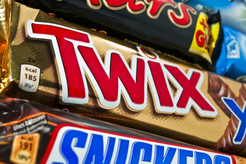 rezekne, latvia - may 1, 2011  close up of milky way, twix, bounty, snickers and mars chocolate bars made by mars, incorporated these chocolate bars are some of the most famous and recognizable candy brands in the world