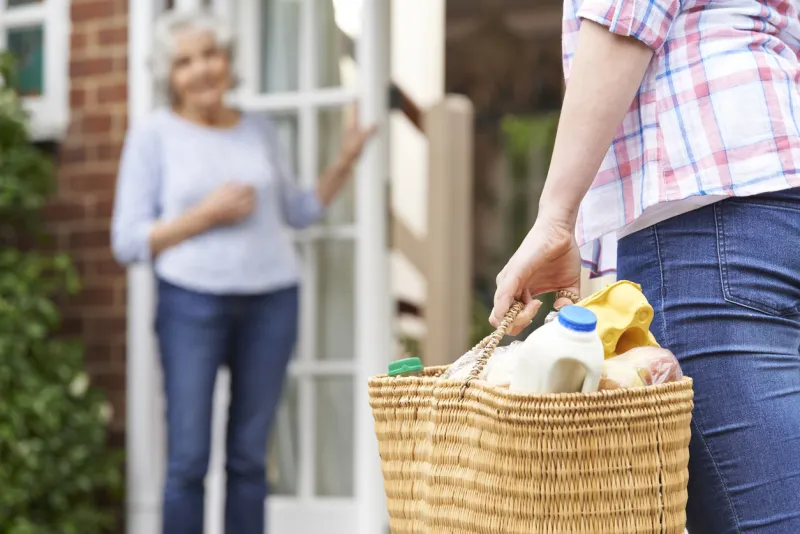 person doing shopping for elderly neighbour