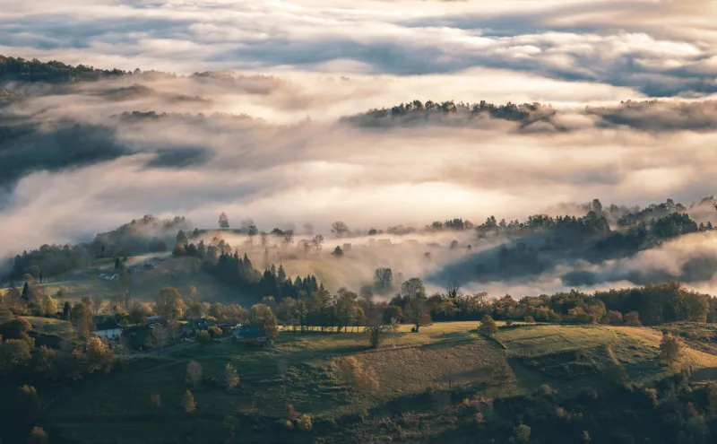 sunrise in the mist over the ariège pyrenees