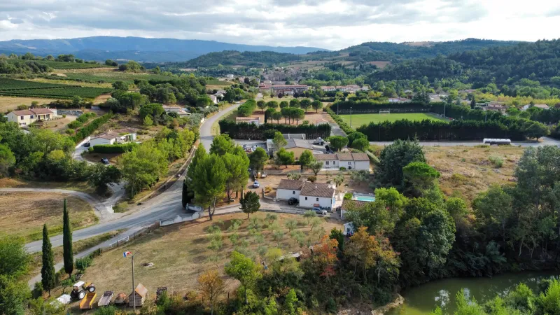 drone view of saint-hilaire village in the south of france