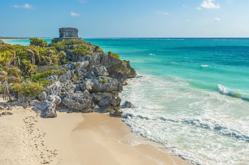 the beautiful beach and mayan god of winds temple along the caribbean sea, quintana roo state, yucatan peninsula, mexico