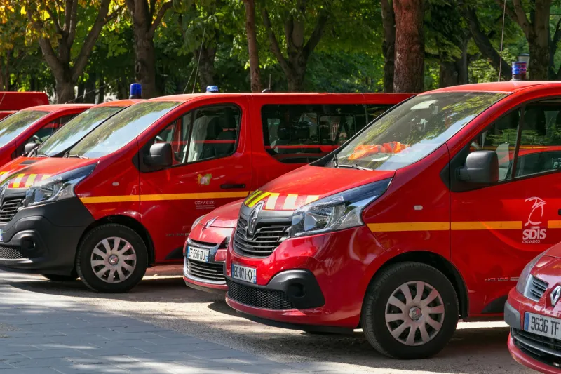 paris, france - june 23, 2017  red cars of the fire and rescue service on the parking in center of paris