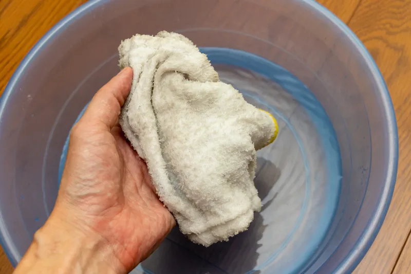 a rag wet with water for cleaning