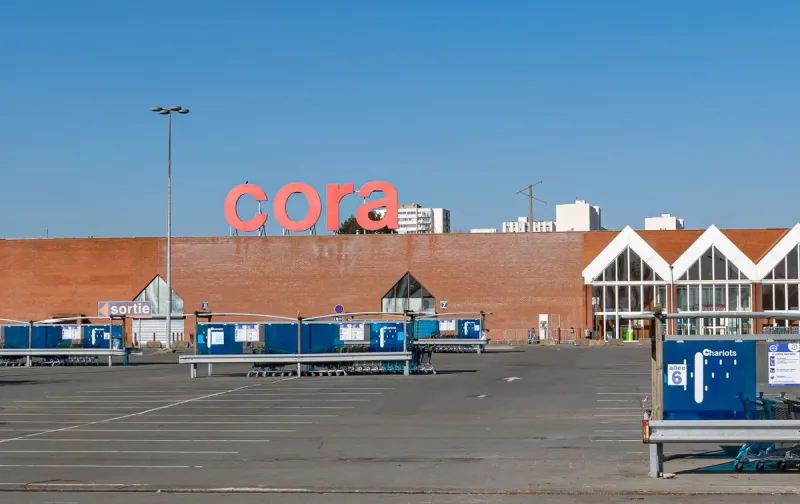 villeneuve d'ascq,france-february 28,2021  view of cora hypermarket,entrance and parkingcora is a belgian international supermarket chain cora was founded in