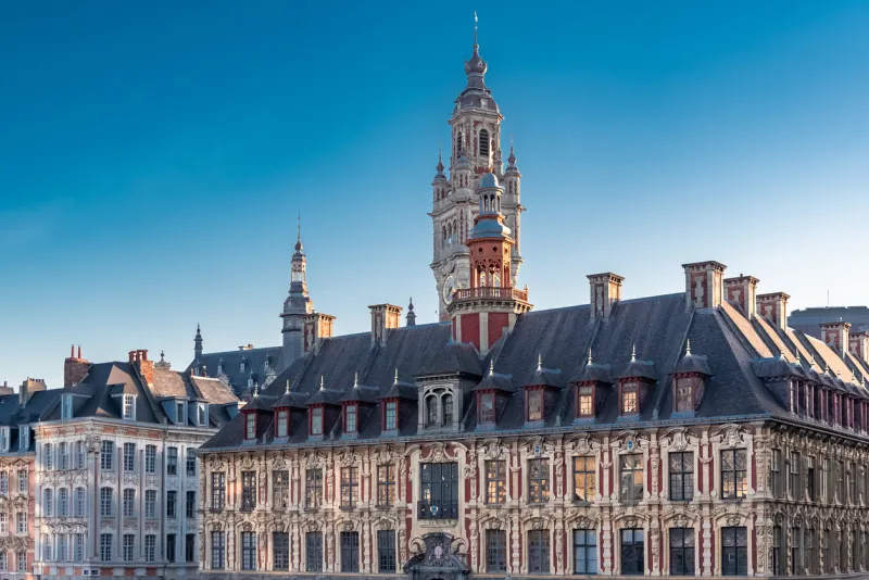 lille, old facades in the center, the belfry of the chambre de commerce in background