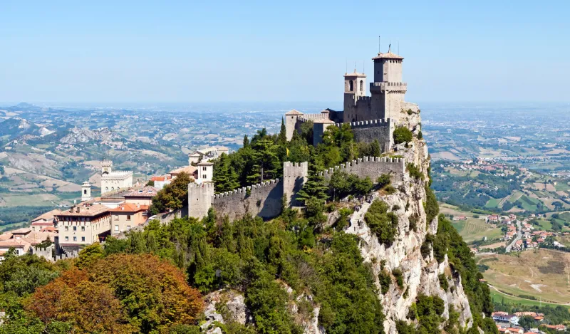scenic view of guaita fortress on monte titano with san marino city in background