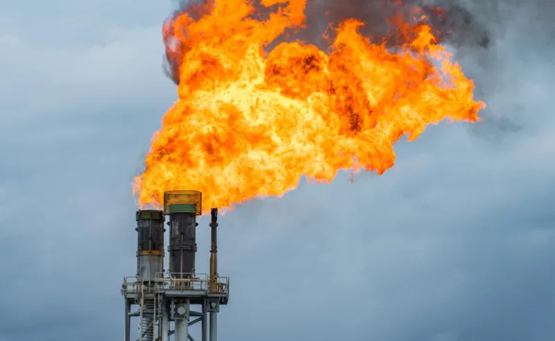 fire on flare stack at oil and gas central processing platform while burning toxic and release over pressure from process