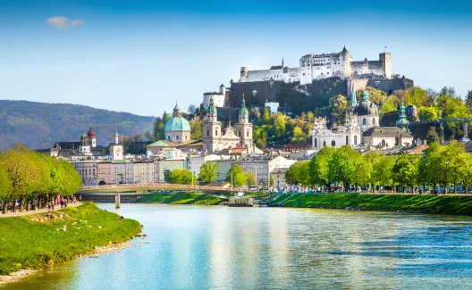 beautiful view of salzburg skyline with festung hohensalzburg and salzach river in summer, salzburg, salzburger land, austria