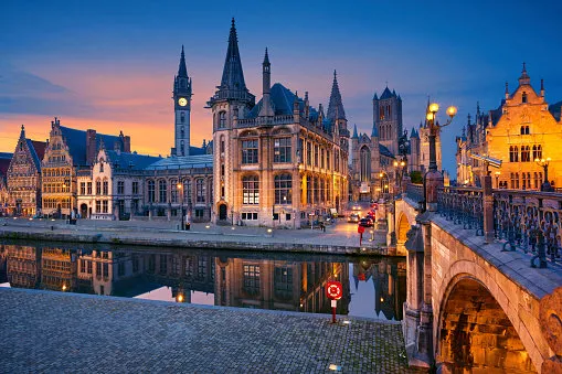 image of ghent, belgium during twilight blue hour