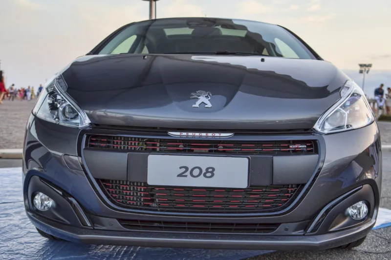 rome,italy - july 21, 2018 on occasion of rome s rally event, the motor showrooms exhibit new cars models in rome  a peugeot 208 car from peugeot automaker