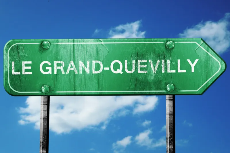 le grand-quevilly road sign, vintage green with clouds backgroun