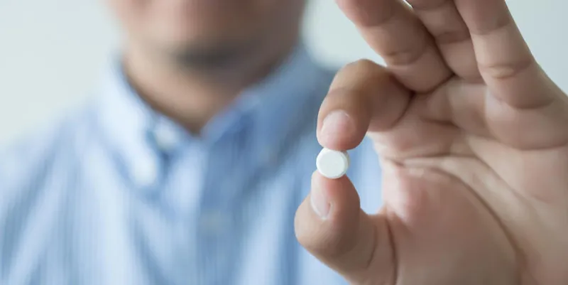 health care female pharmacist hold medicine bottle pharmacist holding at drugstore