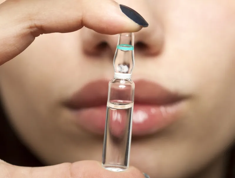 lips and ampoule with botox, hyaluronic, collagen, ha liquid or flu medication