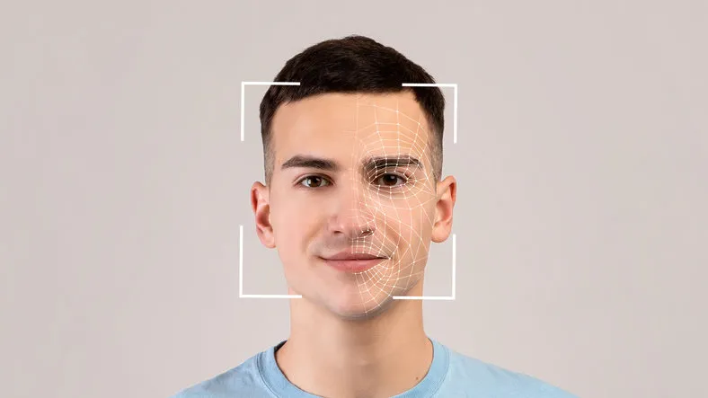 smiling young caucasian male, double exposure with id scan, isolated on light background futuristic and technological face scanning for face recognition and person personal safety, future, security