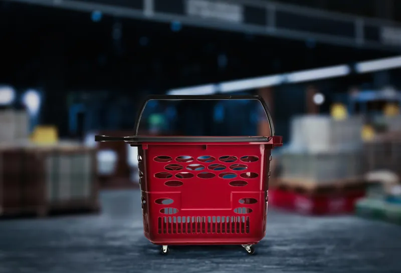 empty plastic red shopping basket in mall