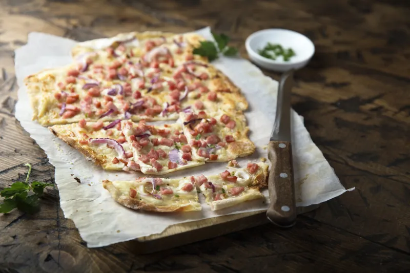 traditional homemade tarte flambee with ham