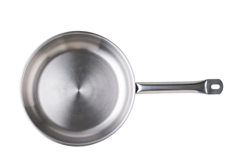metallic frying pan having practical long handle for safe use isolated on a white background empty inox frypan for frying, searing, and browning food top view