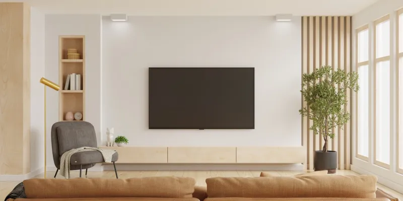 white wall mounted tv on cabinet in living room with dark brown armchair and brown sofa,minimal design3d rendering