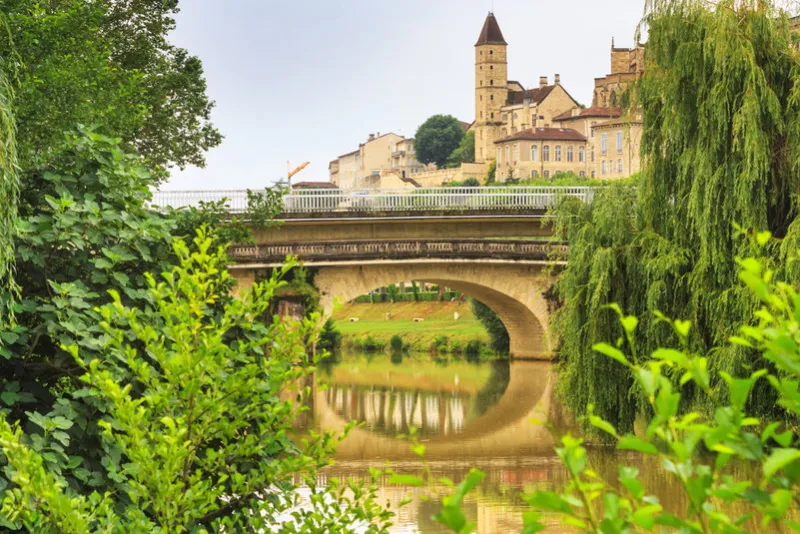 summer city landscape - view of the bridges over the river gers in the town of auch, in the historical province gascony, the region of occitanie of southwestern france