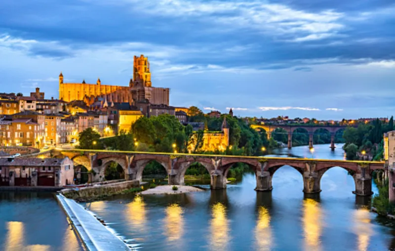 albi featuring the sainte-cecile cathedral and the old bridge over the river tarn unesco world heritage in france