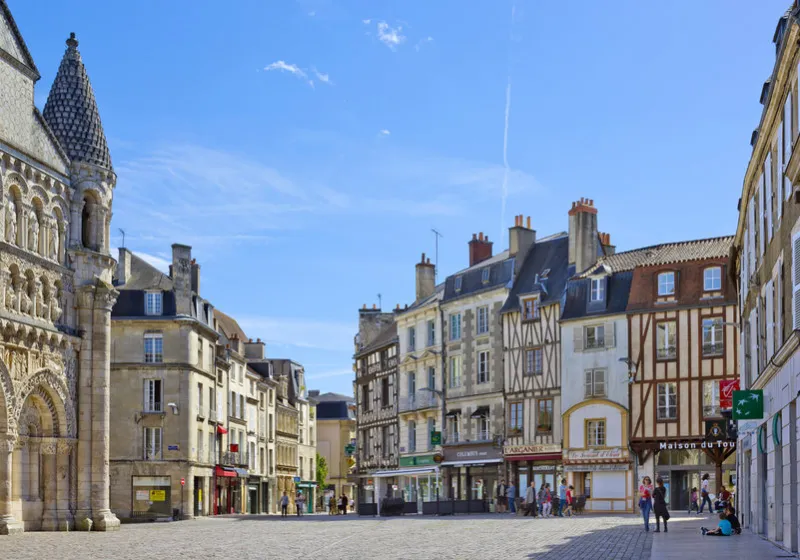 poitiers, france - may 14, 2017  place charles de gaulle with historical buildings with people around