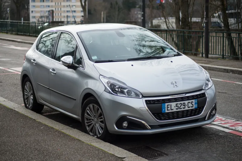 mullhouse- france - 16 february 2020 - front view of grey peugeot 208 parked in the street