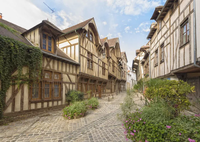 half-timbered houses on alley at the old town of troyes, champagne-ardenne region, france
