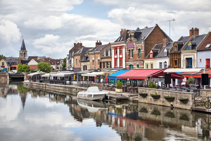 colorful summer verandas of restaurants on the belu embankment in amiens, france