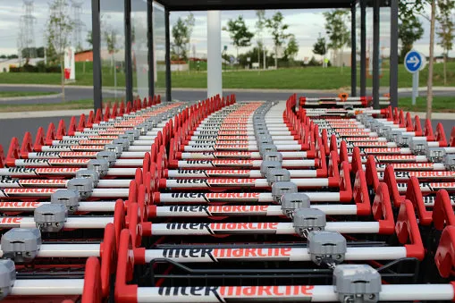 roissy en brie, france - september 6, 2015  this is a photograph where you can see the intermarché brand on a long wire caddy