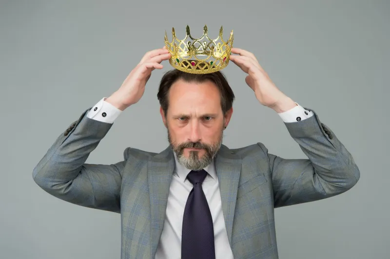 kill your pride before you lose your head big boss wear crown with pride proud businessman grey background bearded man in formalwear pride and egoism pride and ambitions toxic ego