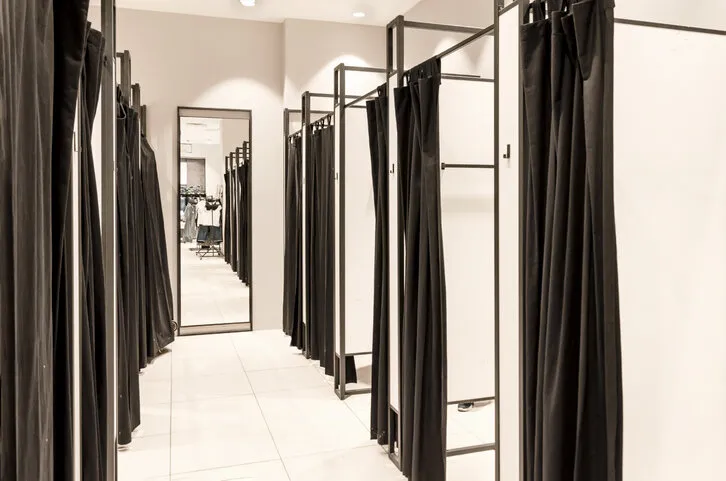 fitting booths in a clothing store dressing room at the store