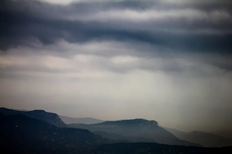 view of the french hills during a storm in provence, france