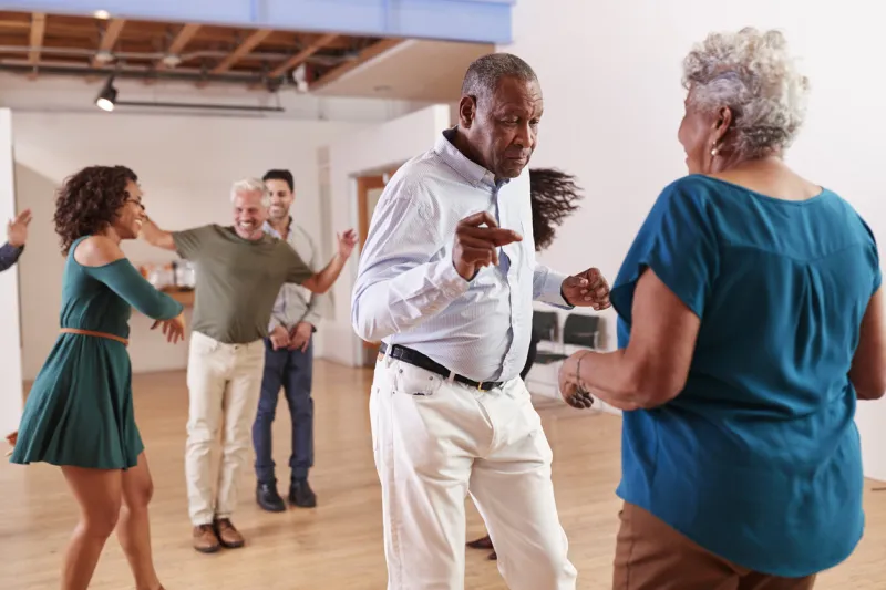 people attending dance class in community center