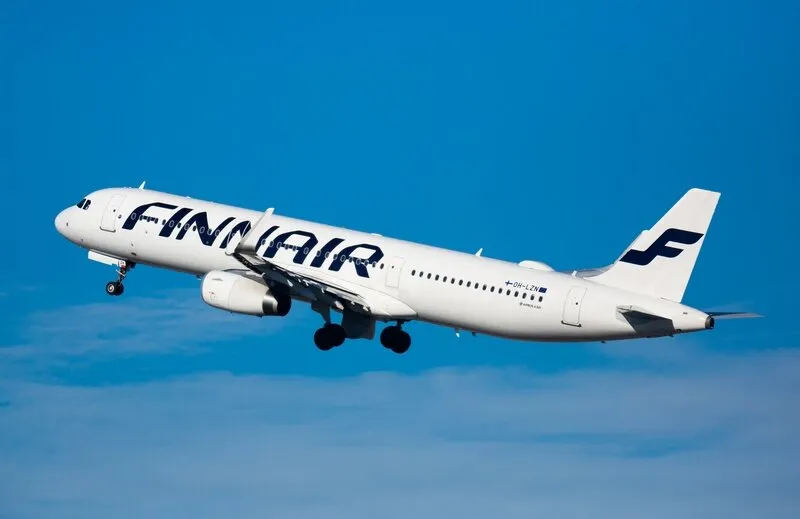 barcelona, spain - february 2, 2020  view of oh-lzn airbus a321 of finnair airlines flies up from barcelona airport (bcn)