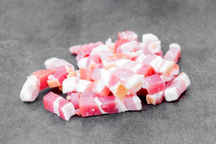 close-up of a smoked bacon on a vintage background