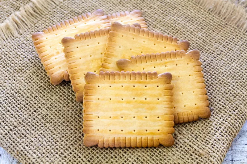 biscuit small butter on a wooden surface