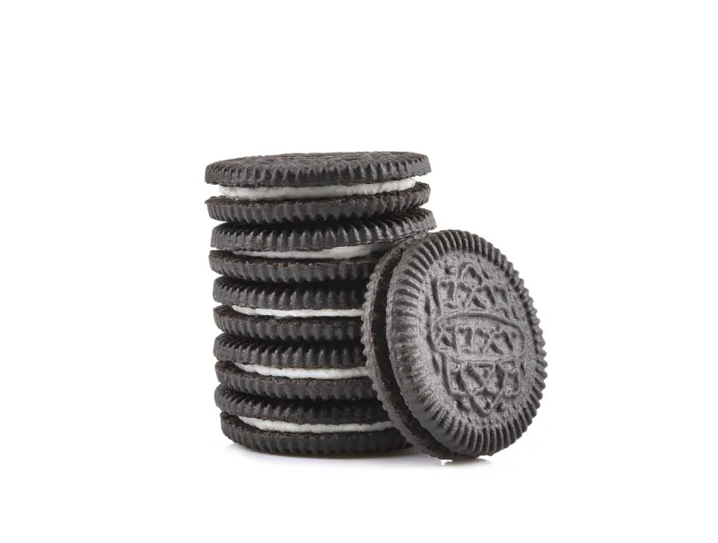 stack of chocolate cookies and cream isolated on white background