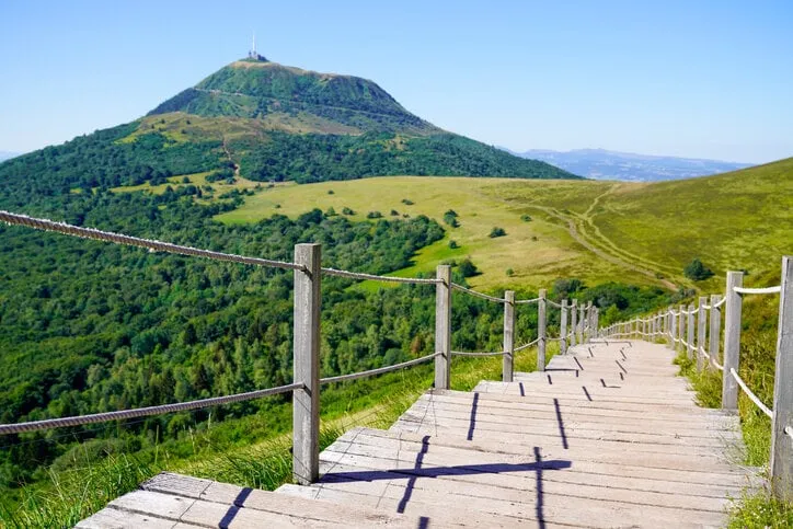 staircase wooden for access to the puy de dôme volcano in auvergne france