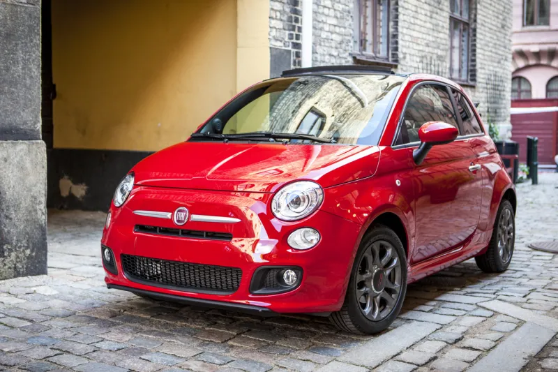 malmoe, sweden - september 10, 2013  a brand new fiat 500 parked in a street in malmoe